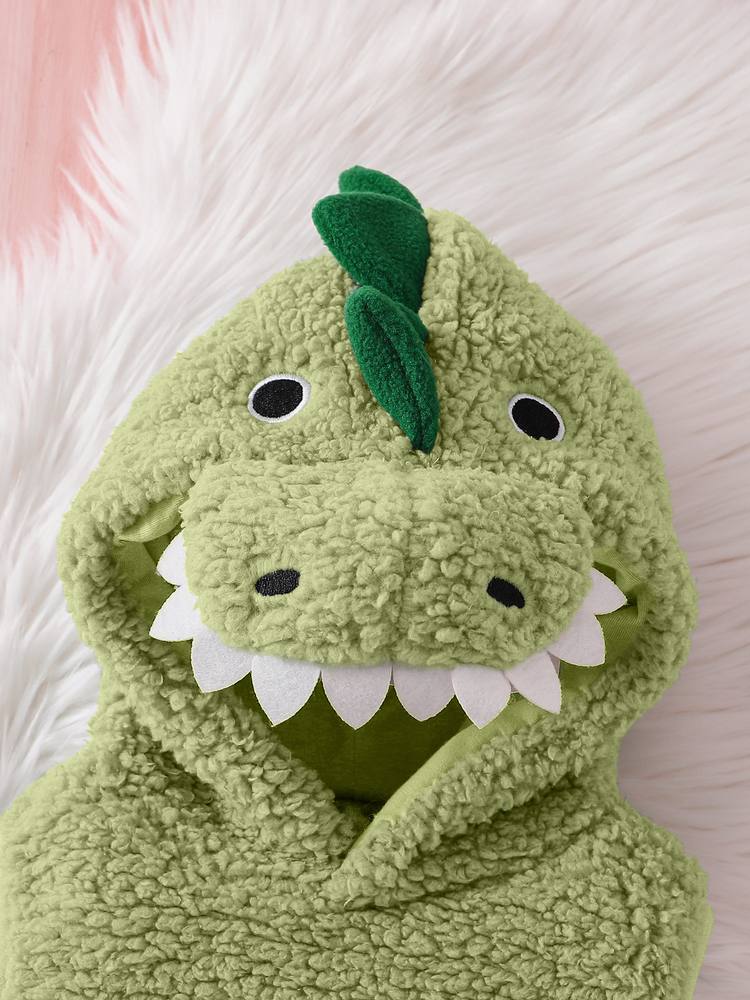 Close-up of the dinosaur hood: felt teeth, eyes and a spike on top